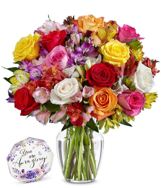 A bouquet of 12 mixed roses and alstroemerias, with an optional vase.